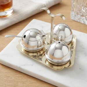 Silver plated salt and pepper shakers with mustard pot, spoon and stand